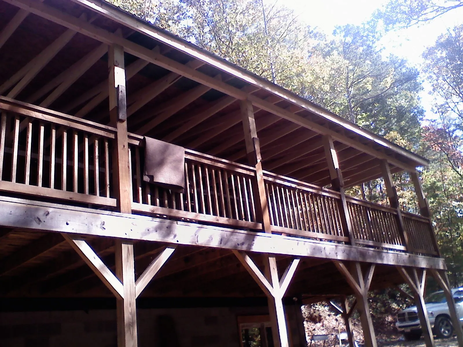 Timber framing under a new elevated porch and deck — Roof Leak Repair in Lawler by Roofing Brothers